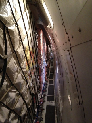 Illustration for article titled Photoshop Contest: What's Apple Really Shipping in Those iPhone Crates?